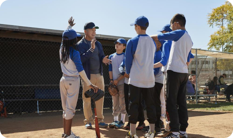 Group of people playing baseball